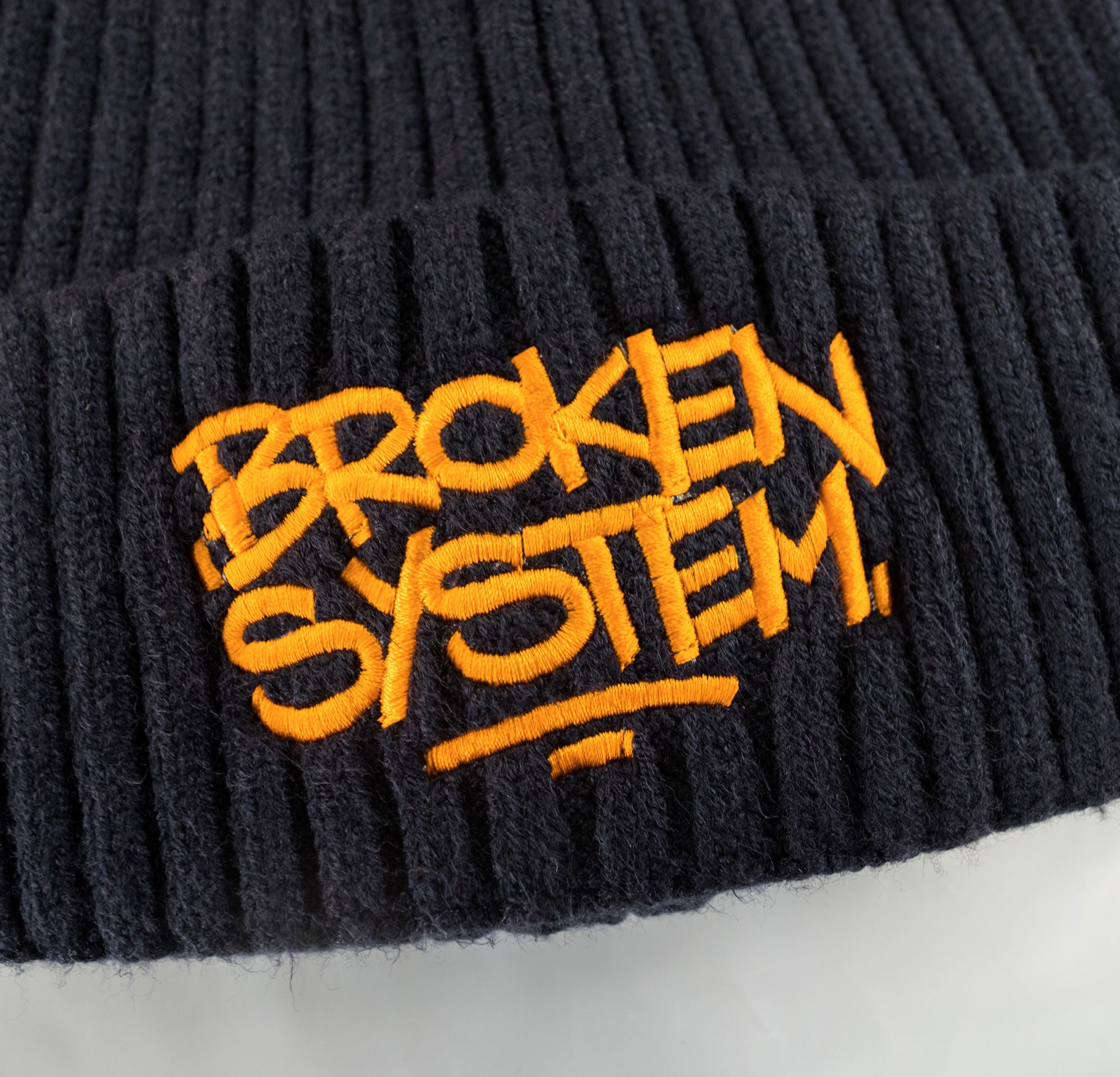 BROKEN SYSTEM BEANIE- Navy & Orange